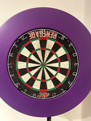 Dartboard with purple - dartboard, surround